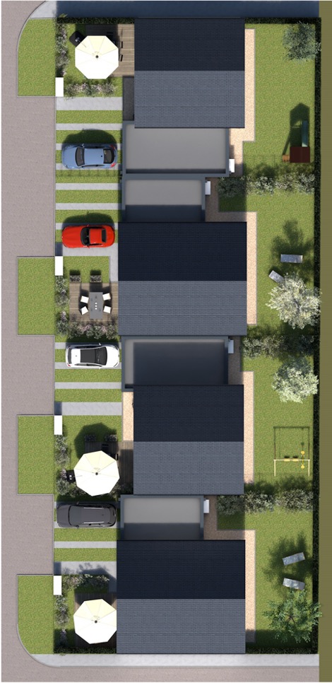 Vue aérienne d'un ensemble de maisons individuelles modernes avec jardins et stationnement à Caen, Normandie.